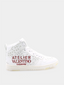 Baskets de luxe pour femme Valentino Garavani en cuir blanc avec logo rouge gravé, alliant confort, élégance et qualité haut de gamme